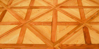 Intarzijski parket Pod intarzijski parket spadajo tudi ornamenti in bordure